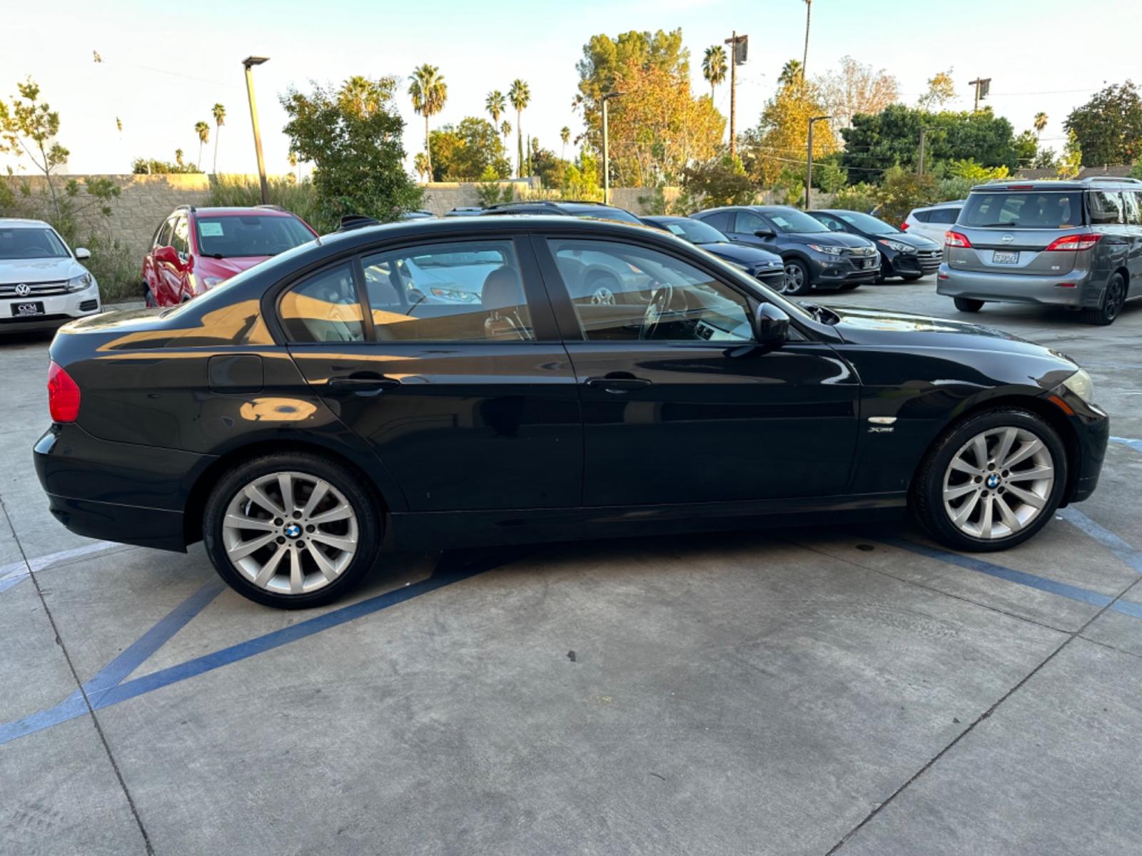 2011 /Tan BMW 3-Series 328i xDrive (WBAPK7C58BF) with an 3.0L L6 DOHC 24V engine, Automatic transmission, located at 30 S. Berkeley Avenue, Pasadena, CA, 91107, (626) 248-7567, 34.145447, -118.109398 - X Drive! South African Edition! Moon-roof! Leather! 2011 BMW 3-Series 328i xDrive - Luxury Meets Practicality in Pasadena, CA Dive into a realm where luxury and performance synchronize seamlessly. The 2011 BMW 3-Series 328i xDrive is not just a car; it's an experience. This model boasts BMW's - Photo #5